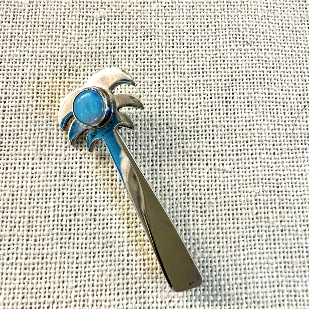 Sterling silver palm tree pin with Opal. Measures 1 3/4  inches long.